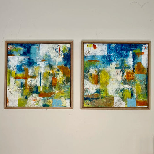 Two abstract cold wax and mixed media paintings on wood panels, framed in oak, with vibrant colors and geometric patterns,